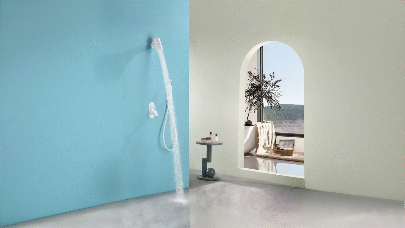 HomeShow Meng Series white shower set, installed on light blue wall, soft water flow, modern bathroom decor