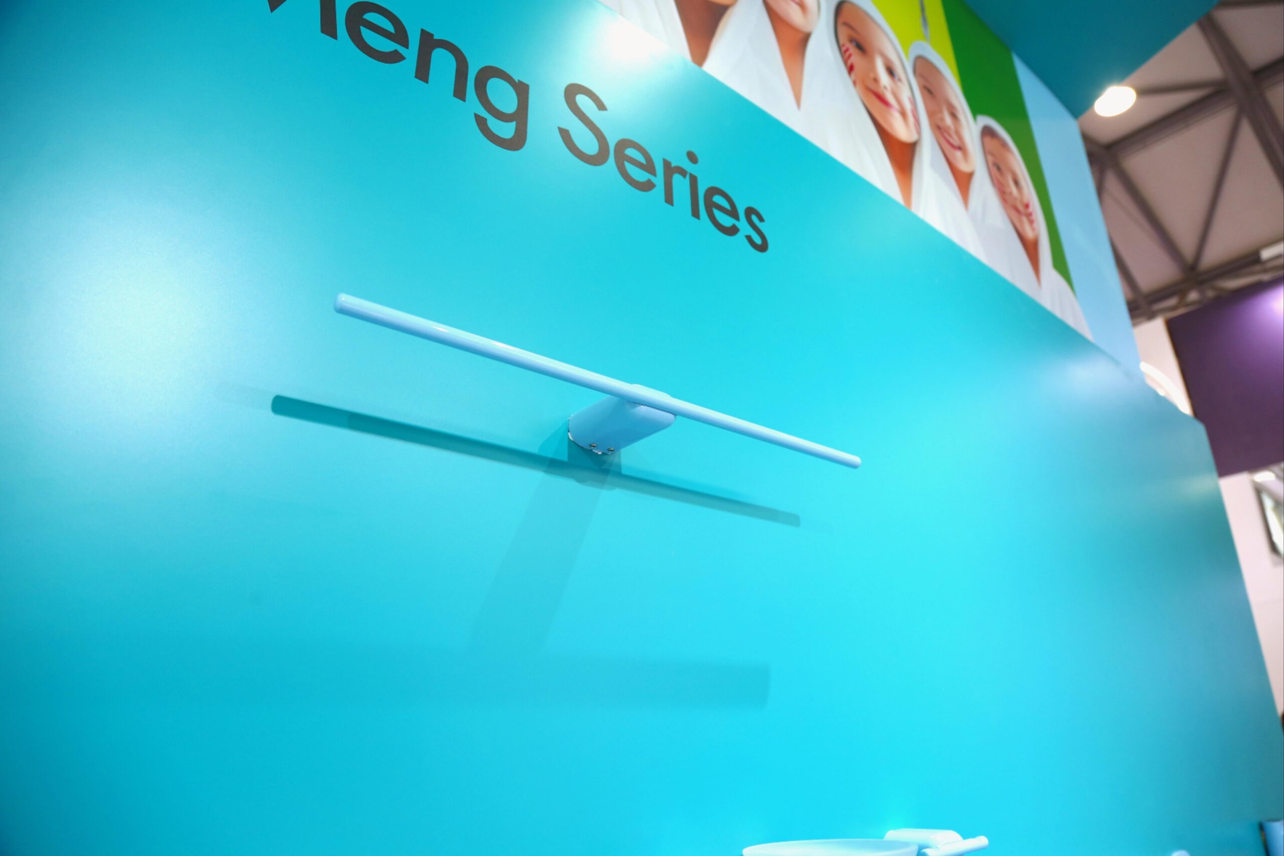 Light blue Meng Series basin faucets mounted on wall, sleek modern bathroom tap design