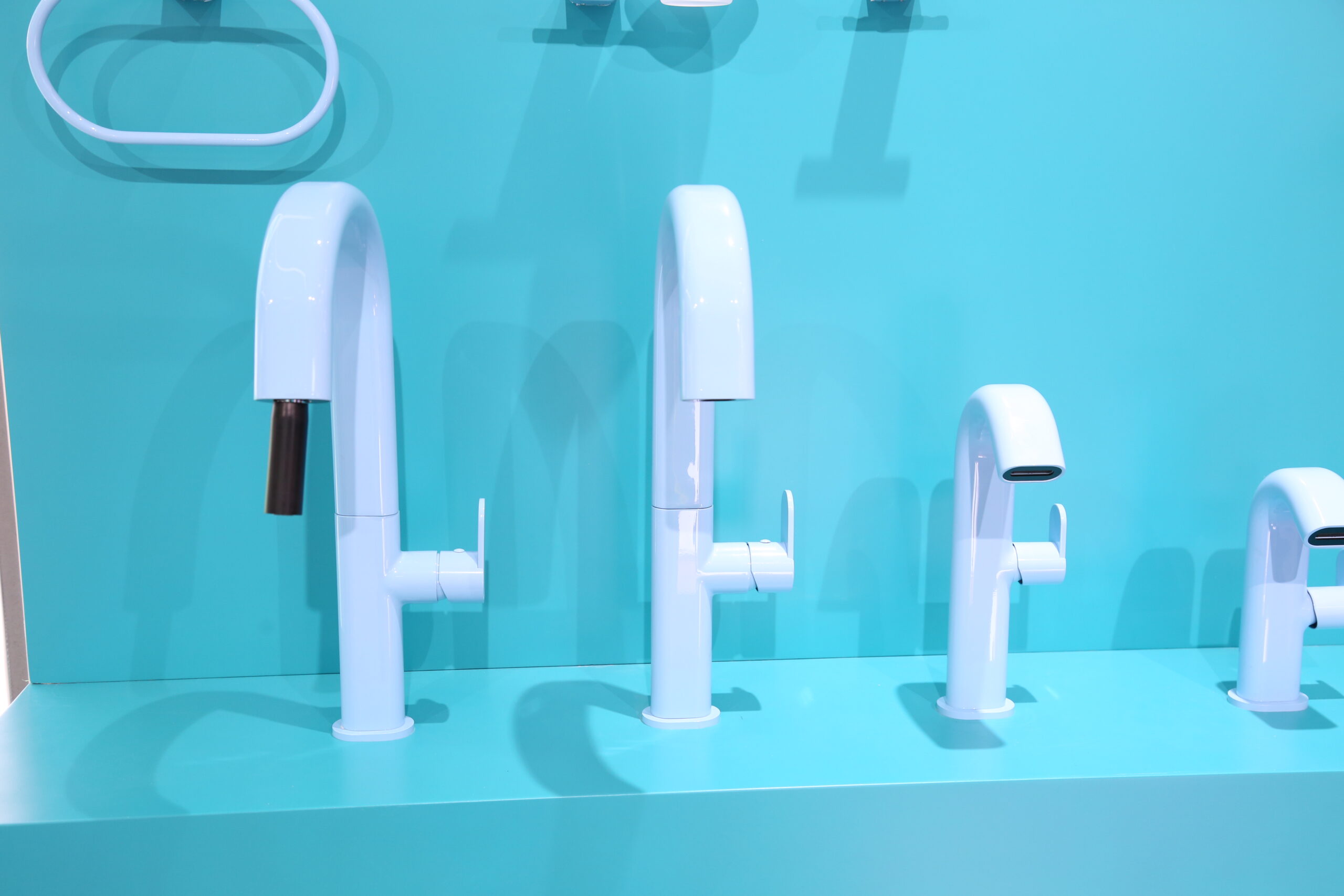 Close-up of white Meng Series basin faucet, minimalist design bathroom hardware