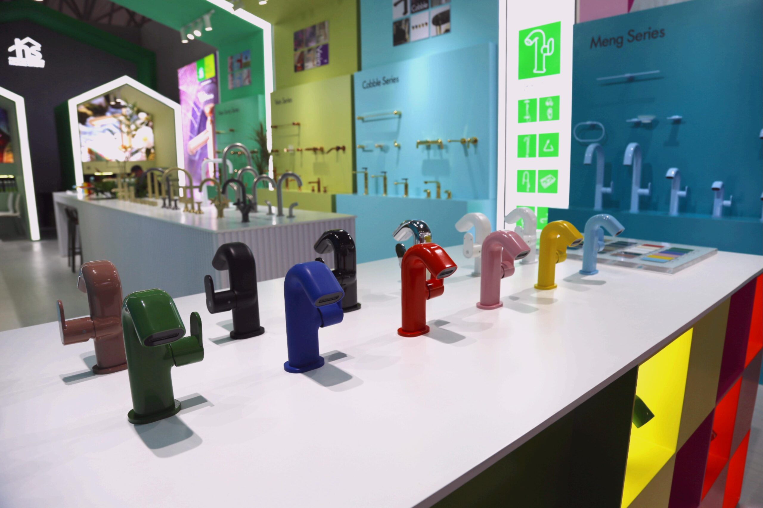Colorful Meng Series basin faucets on display, various vibrant bathroom taps for modern homes